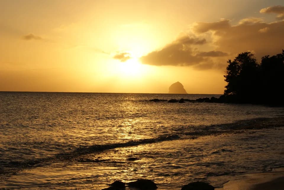 Sunset over Diamond Rock, seen from the beach in Martinique